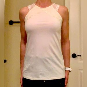 H&M cream colored tank with lace detail. Size medium